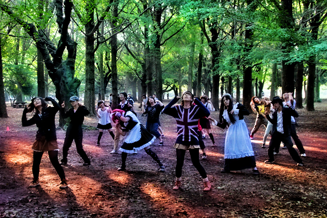 Young Japanese people dancing in Yoyogi Park